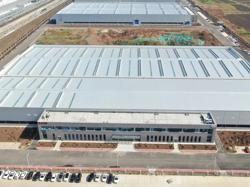 Bini ta' Ħażna ta' Struttura ta' l-Azzar
